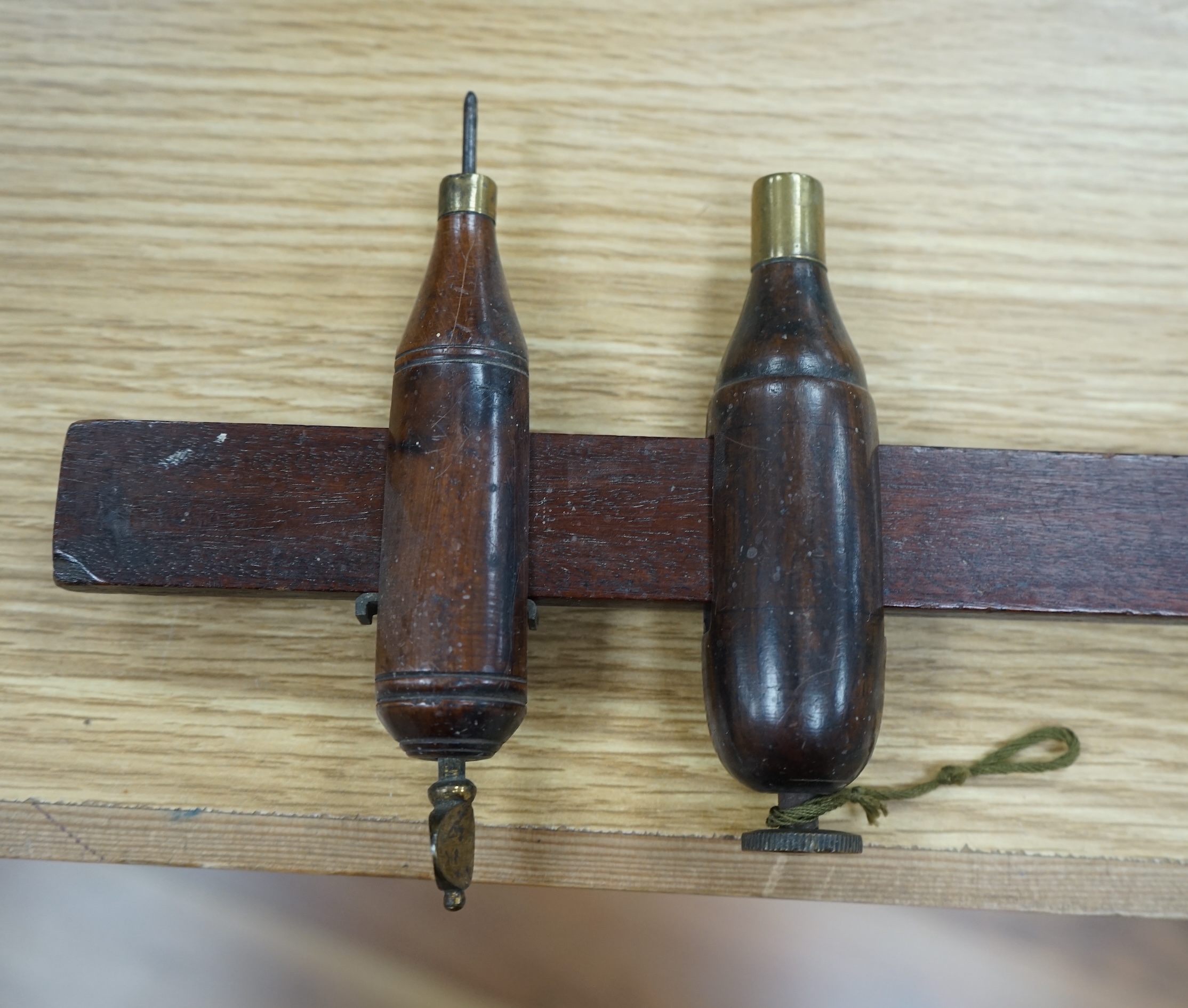 A collection of 19th and 20th century drawing instruments, including; levels, rulers, a set square etc. longest 79cm. Condition - variable, mostly fair to good